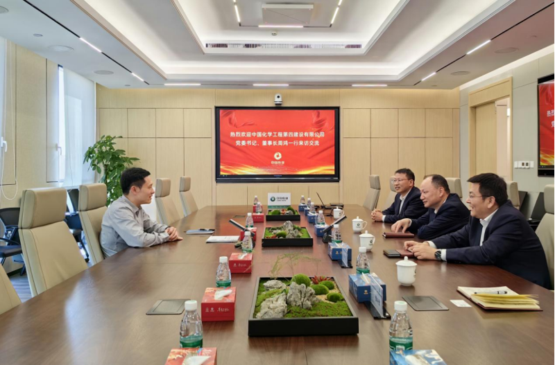 周鴻拜訪中國紙業黨委書記、董事長、總經理鐘天崎